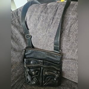 Roots Venetian Village Prince black leather crossbody bag. Vintage Tribal.